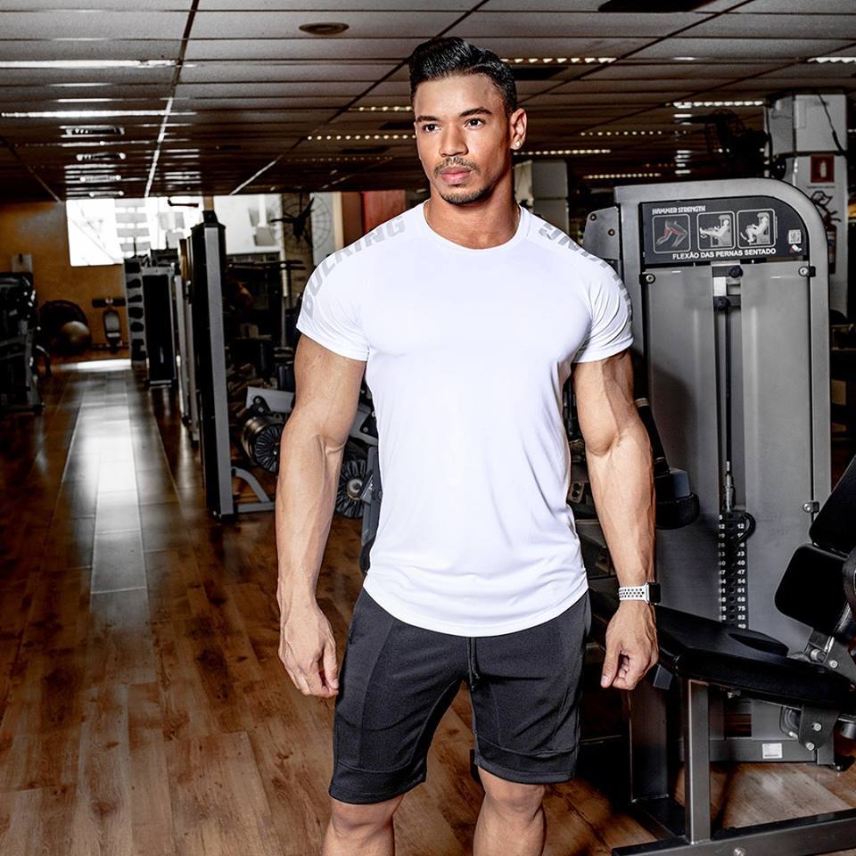 Muscle fit GeToday performance gym t-shirt in black, showcasing streamlined design and athletic fit for workout wear.