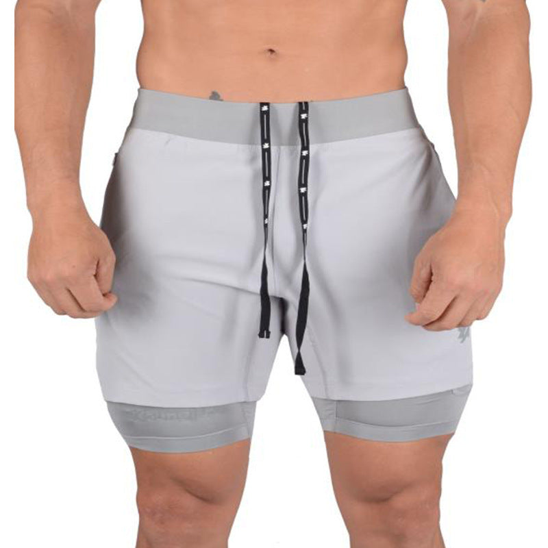 Black GeToday 2-in-1 compression gym shorts with built-in support and sleek design, ideal for workouts and active wear.