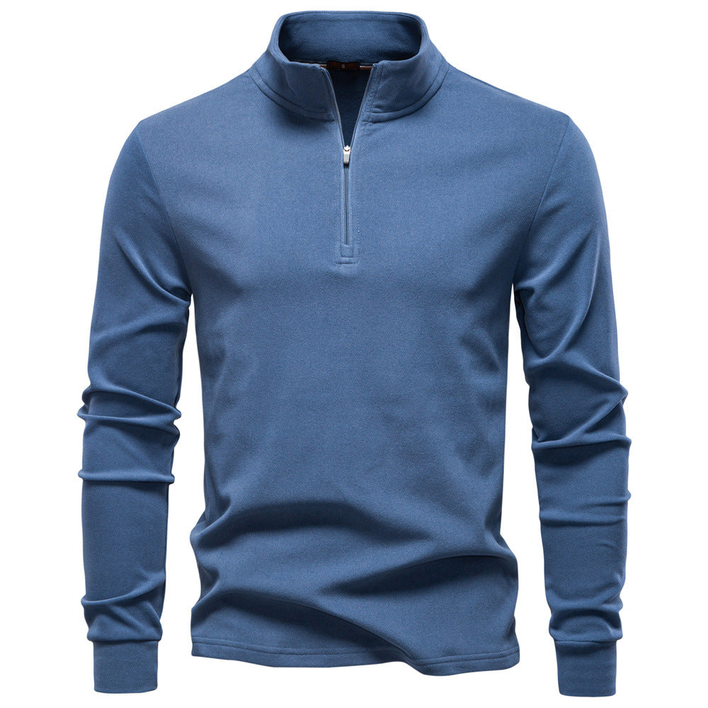 Men's GeToday half-zip thermal base-layer gym wear, close-up view showing soft fabric and thermal design for workout warmth.
