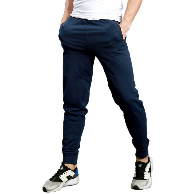 Men's spring and summer slim fit jogger pants by Pump Lab Fitness, showing lightweight athletic gym pants with elastic waistband and tapered fit.