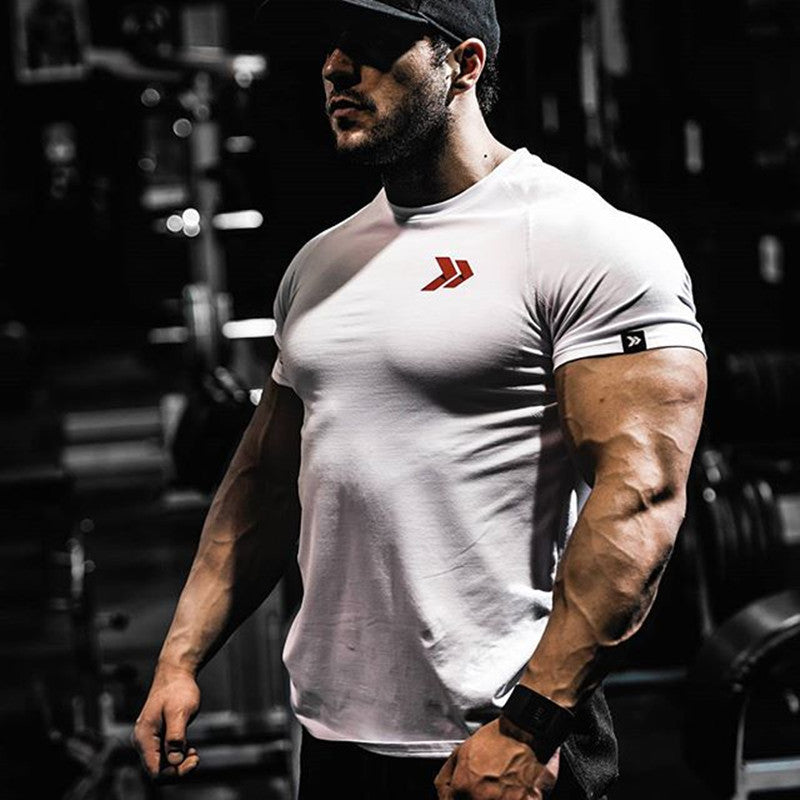 GeToday muscle fit leisure T-shirt, gym wear, in black with crew neck and short sleeves, worn by a male model.