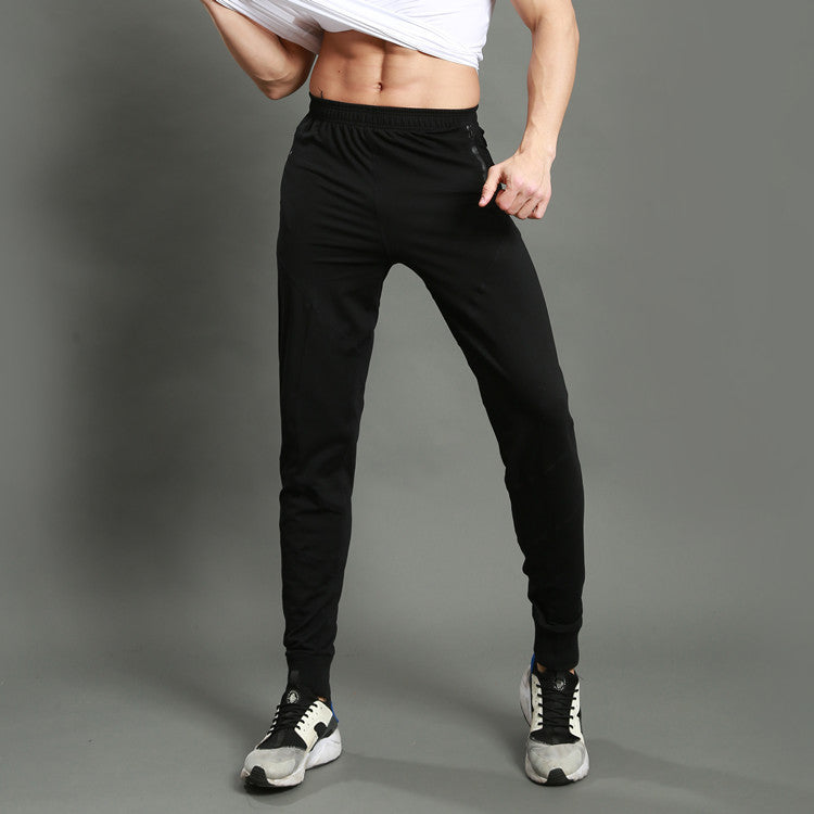 Men's slim fit jogger pants by Pump Lab Fitness, designed for spring and summer gym workouts, shown in dark athletic fabric.