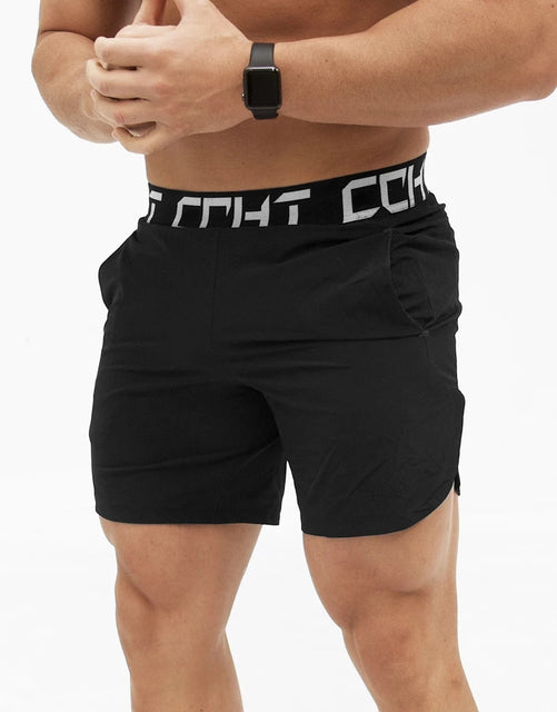Lightweight men's elastic jogger shorts from Pump Lab Fitness, shown in a casual fit with drawstring waist and relaxed style.