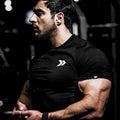 GeToday muscle fit leisure T-shirt for gym wear, featuring a snug fit and comfortable fabric, shown in a casual style.