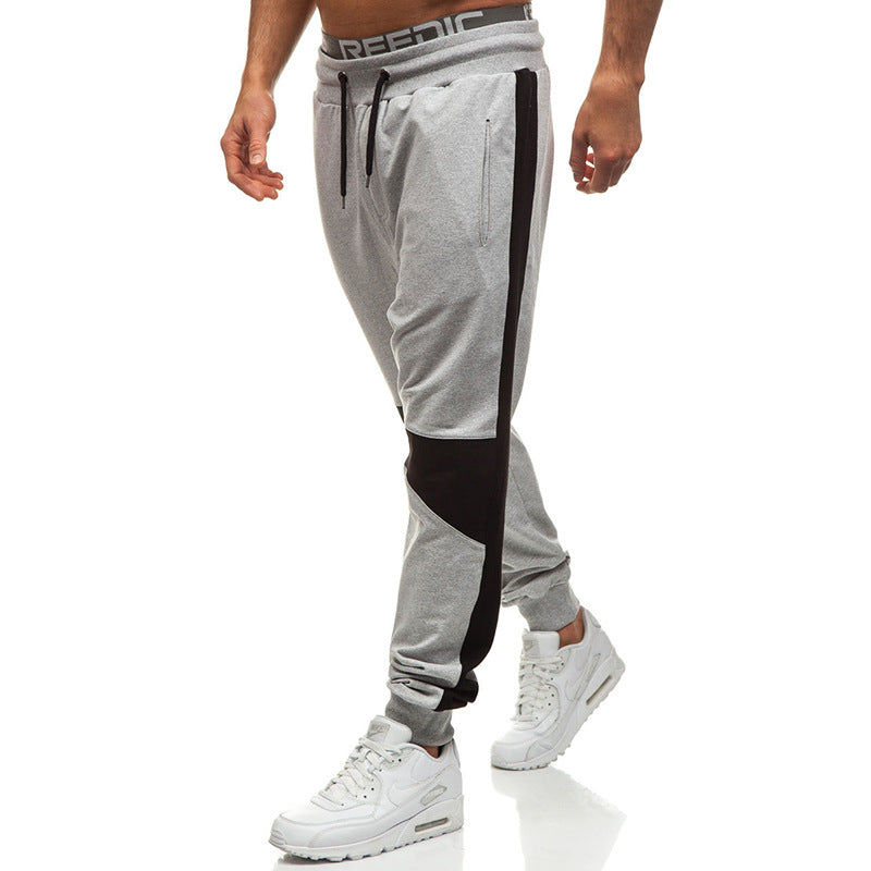 Color block men's hoodie and jogger set by Pump Lab Fitness, featuring a sporty design with comfortable fit and vibrant colors.